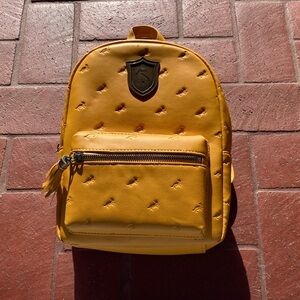 NWT Harry Potter Hufflepuff Yellow Crest Mini Backpack